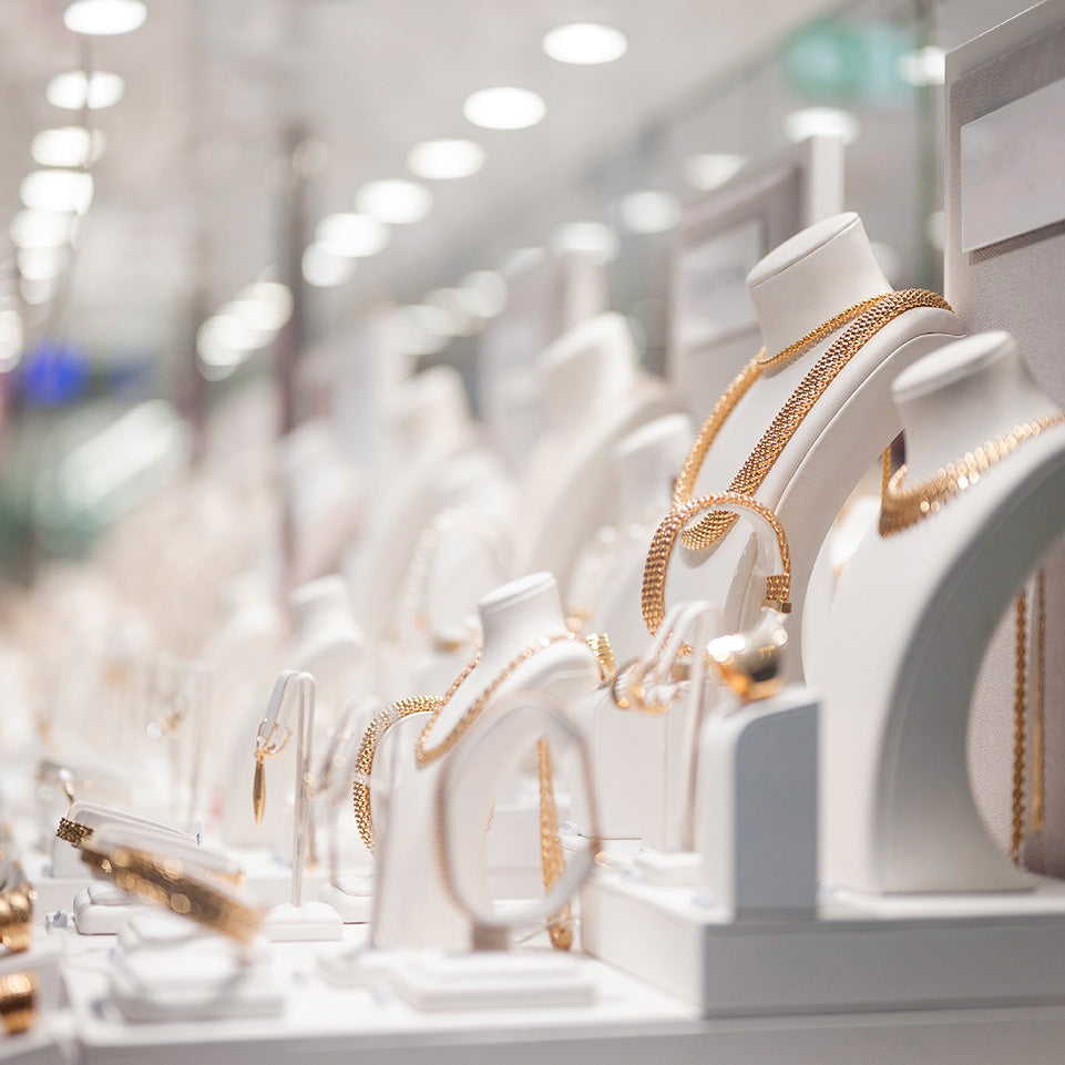 A store display of fine jewelry highlighting the difference between Milano vs. traditional retail