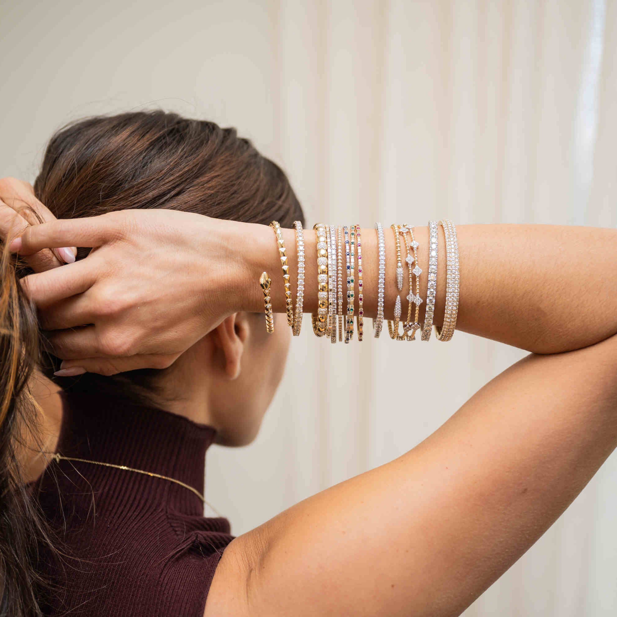 The Art of the Arm Stack: Your Guide to Building a Signature Bracelet & Bangle Collection