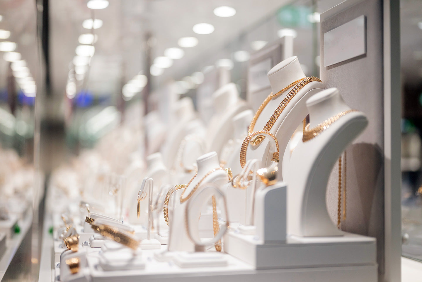 A store display of fine jewelry highlighting the difference between Milano vs. traditional retail